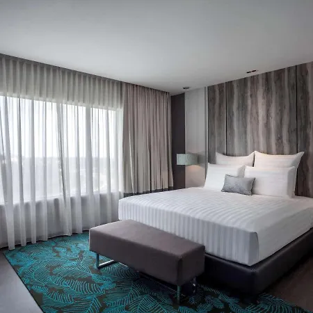 Pullman Miri Waterfront Hotel Exterior photo A bedroom at the hotel